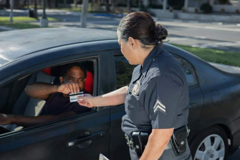 policewoman getting driver's license